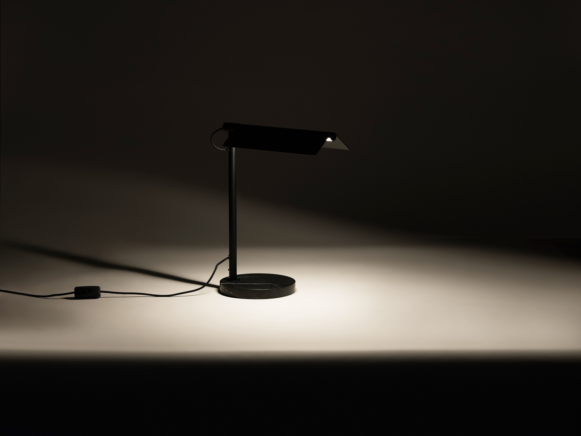 The Oxford side table lamp with light on